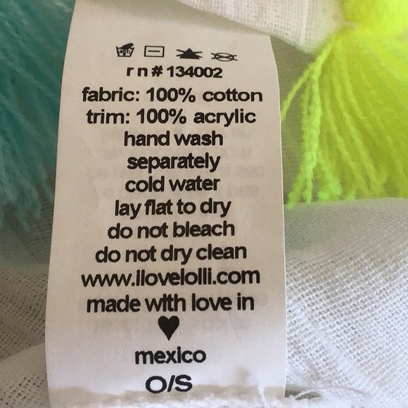 Lolli White cotton cover up with multi colored fringe. - Picture 7 of 7